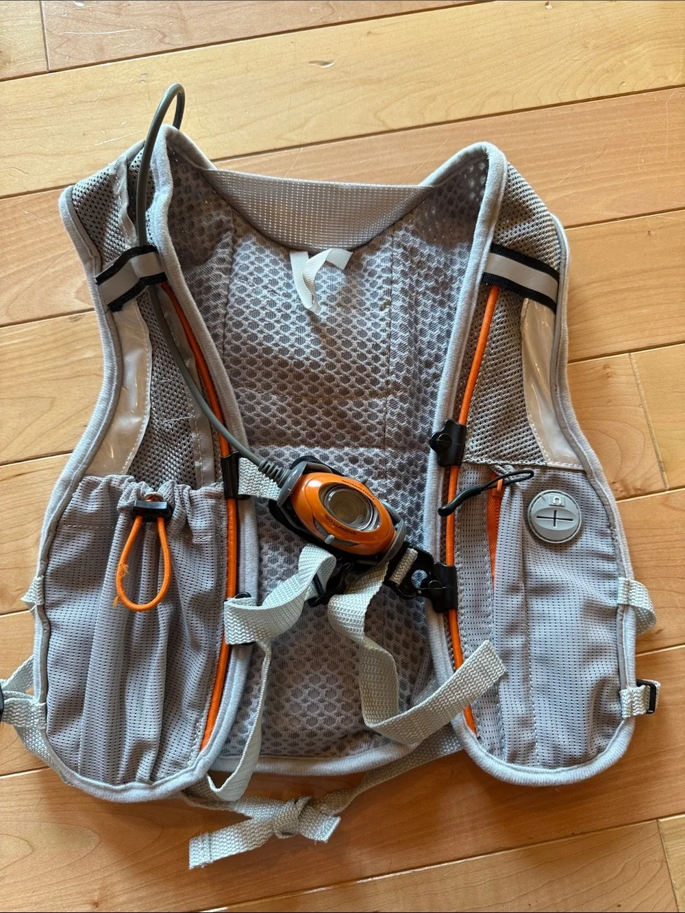 GoMotion unisex Hydration Vest in Gray with Orange Accents